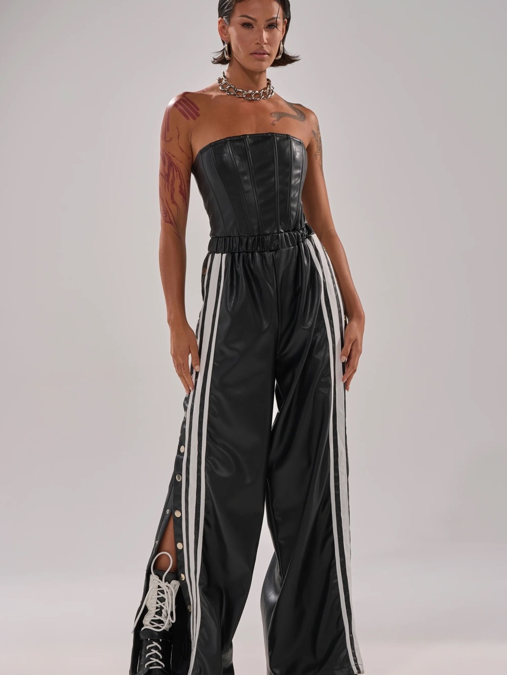 Akira Black Faux-Leather Wide Leg Jumpsuit with Side Stripe